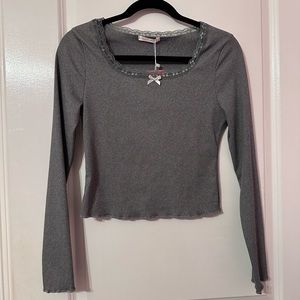 grey coquette shirt